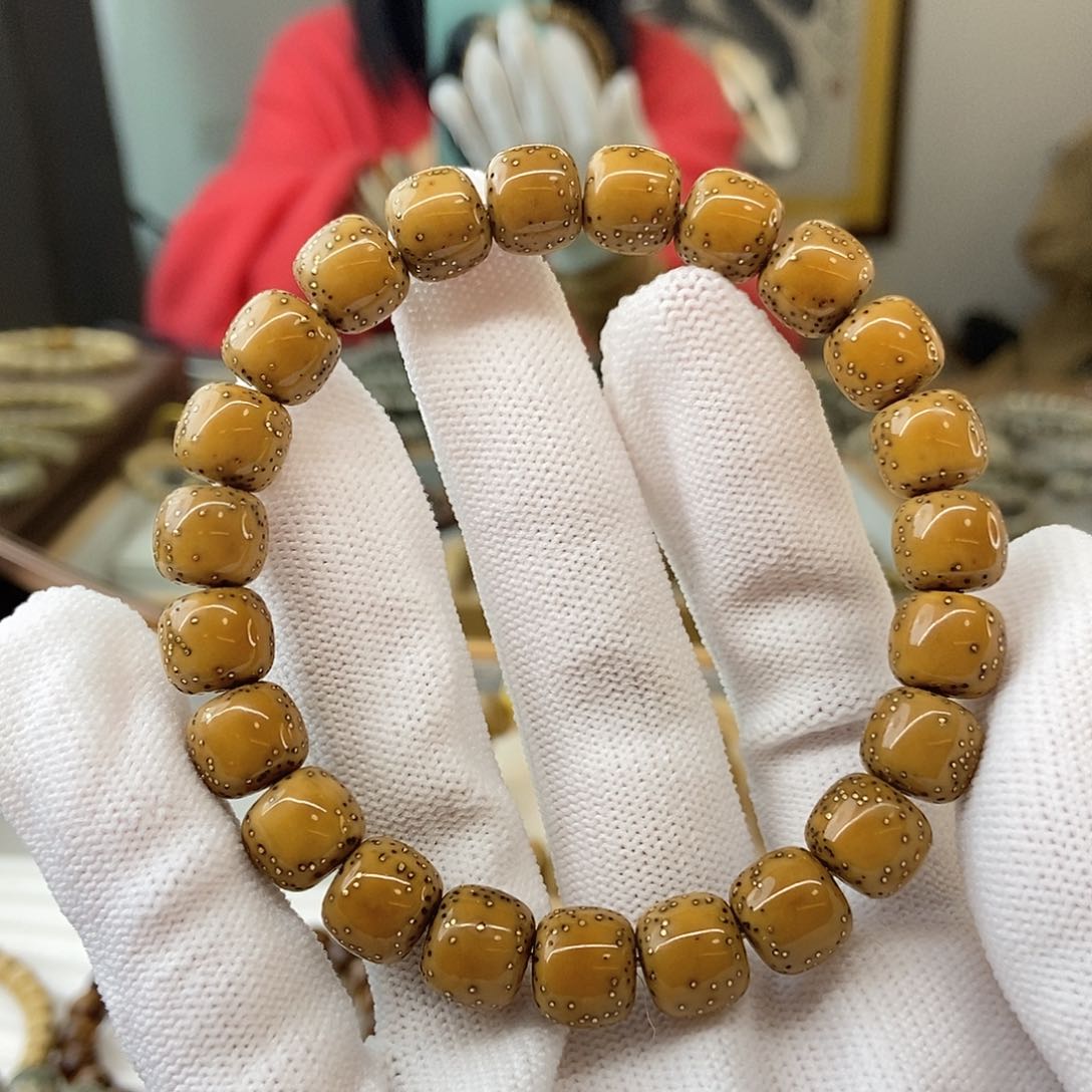 星月菩提手串10鸡油黄贯穿