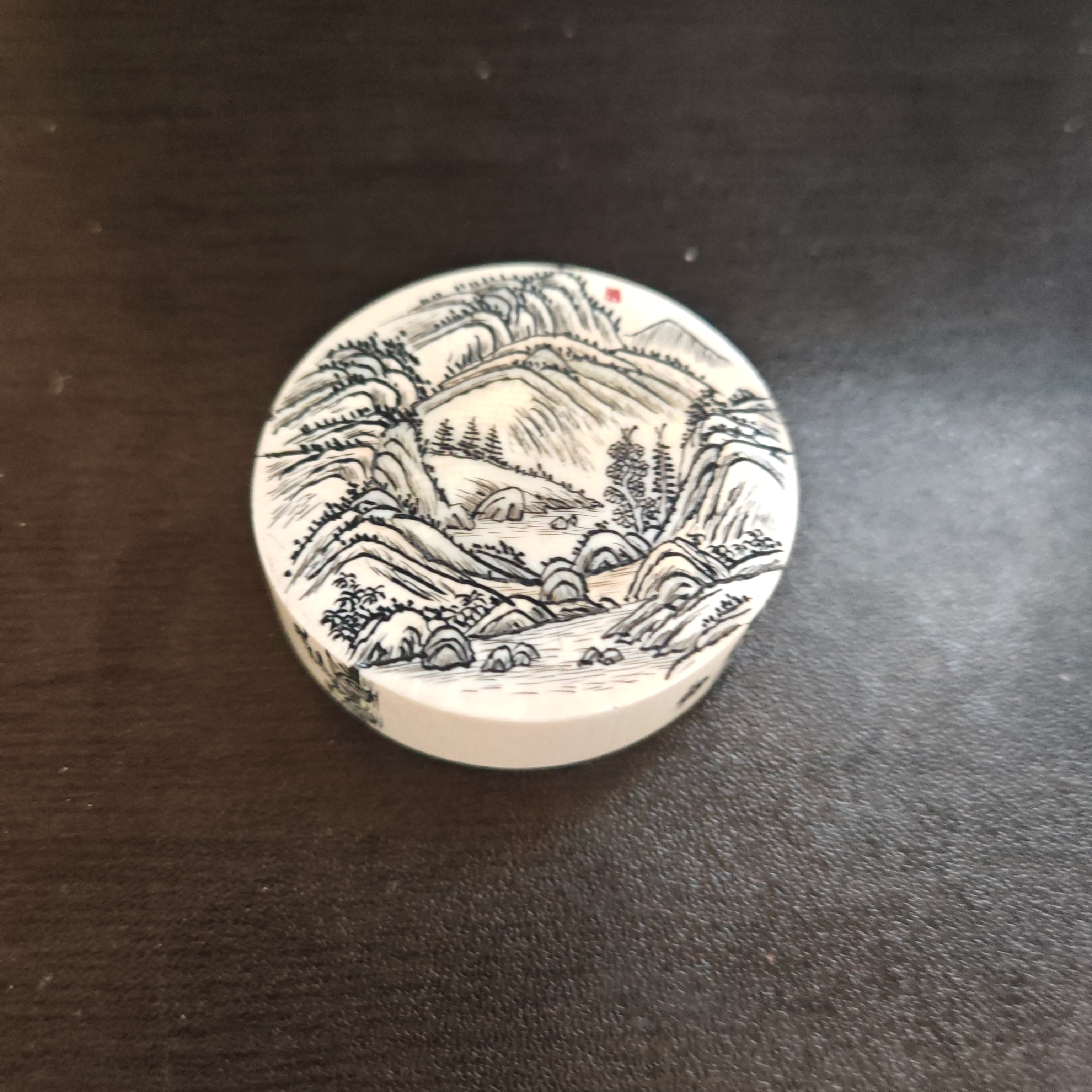 猛犸约40.9克雕刻圆饼XL44