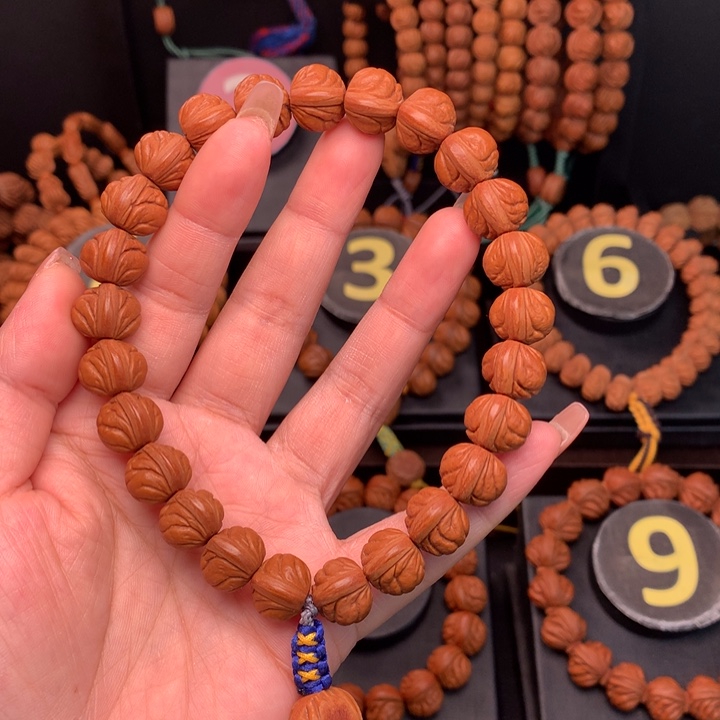 桃核吊坠1.3野生玉龙脊手串