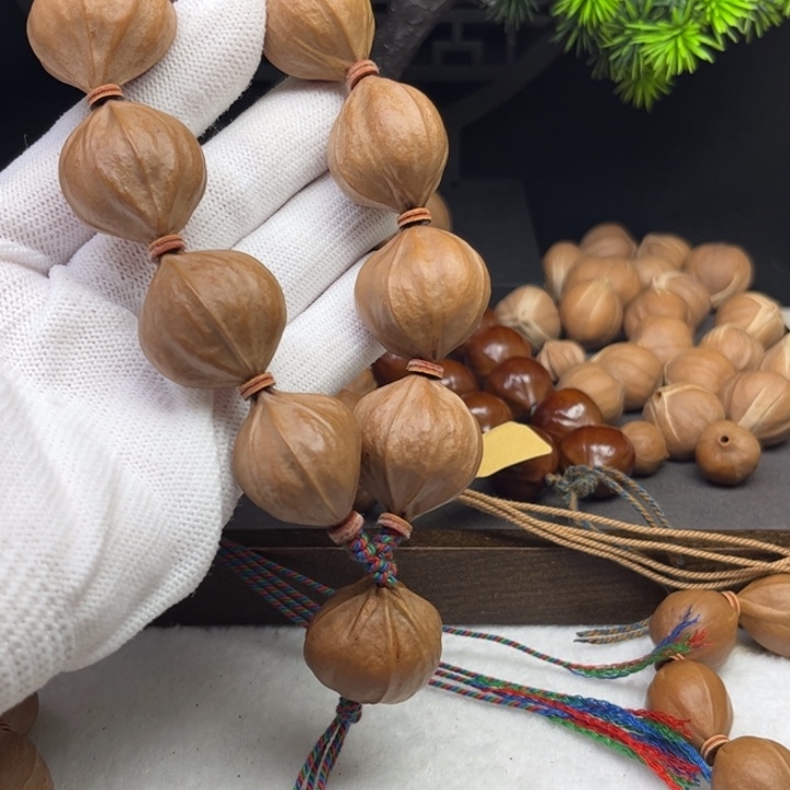 西***5手串/手链橄榄核2.5*2.6原皮四花铁核10颗