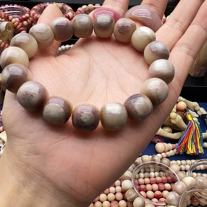 乙***几其他驼骨三花手链14