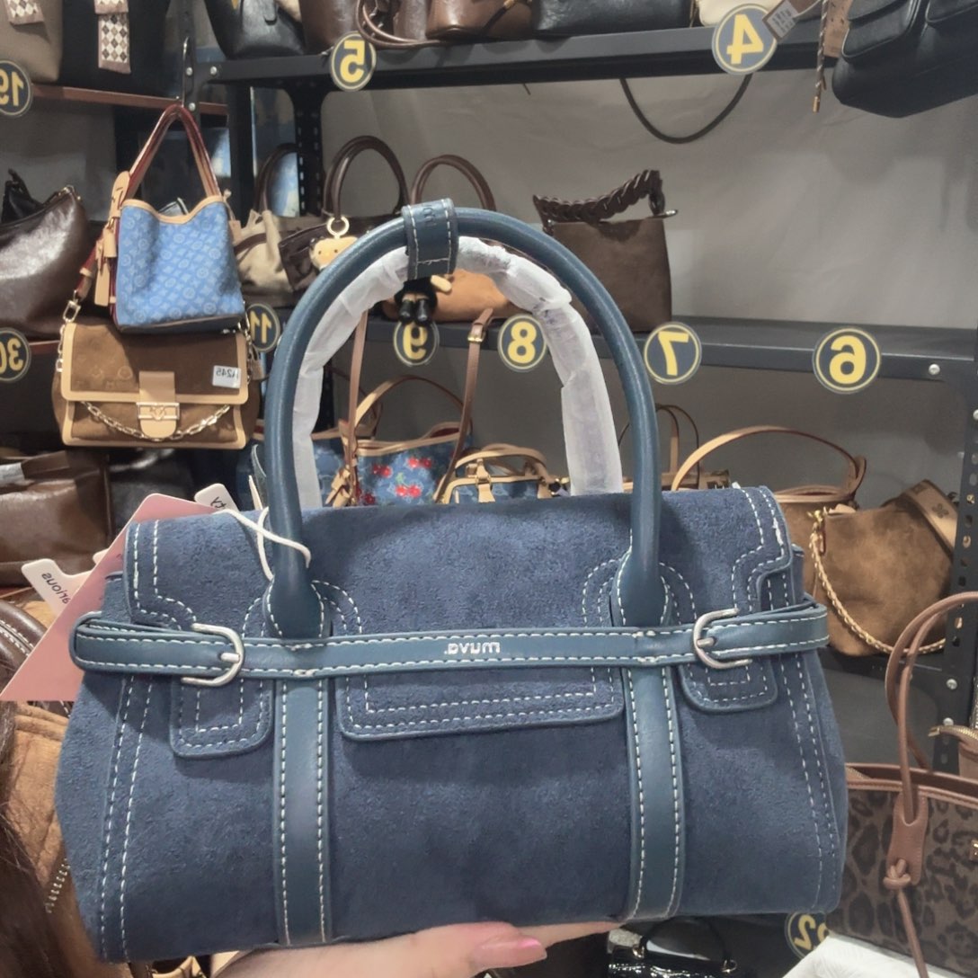 蚕丝蓝色的手提磨毛可斜挎