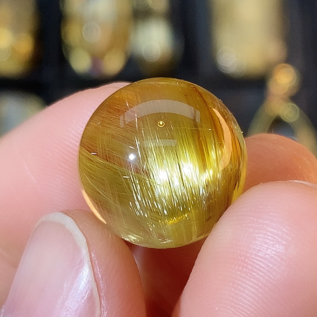 阿***头颈饰水晶未镶嵌天然净体钛晶单珠直径15.9毫米