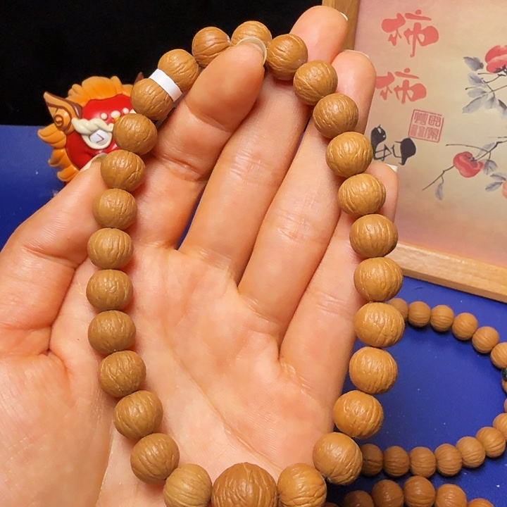 醉***风猴头核桃吊坠凤羽