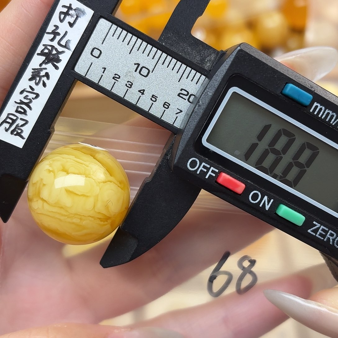 请***称蜜蜡未镶嵌裸石蜜蜡