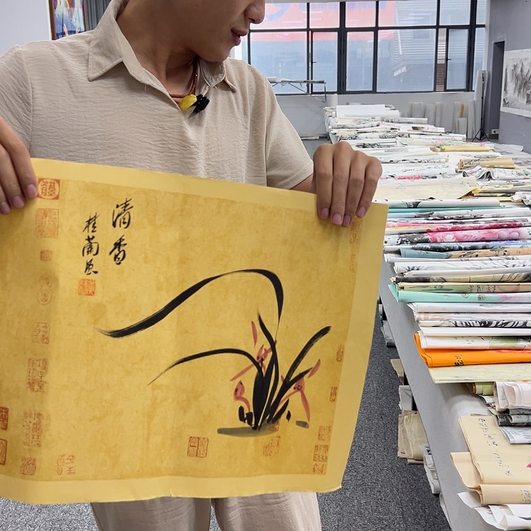 国画卖字画的小男孩