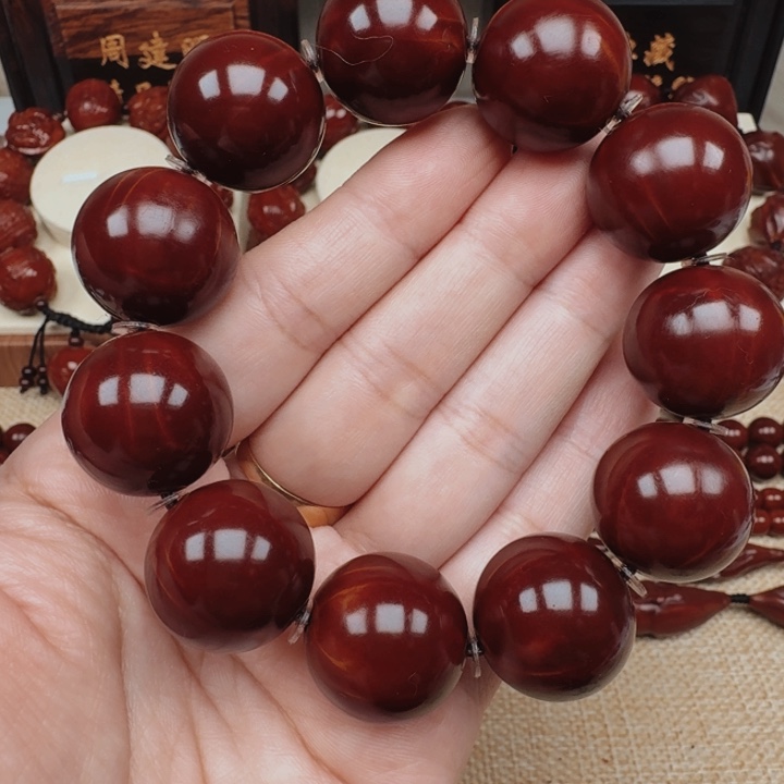 周*磊橄榄核正圆光珠88