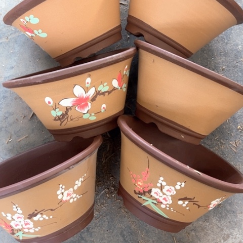 紫砂花盆100-8。  25-13