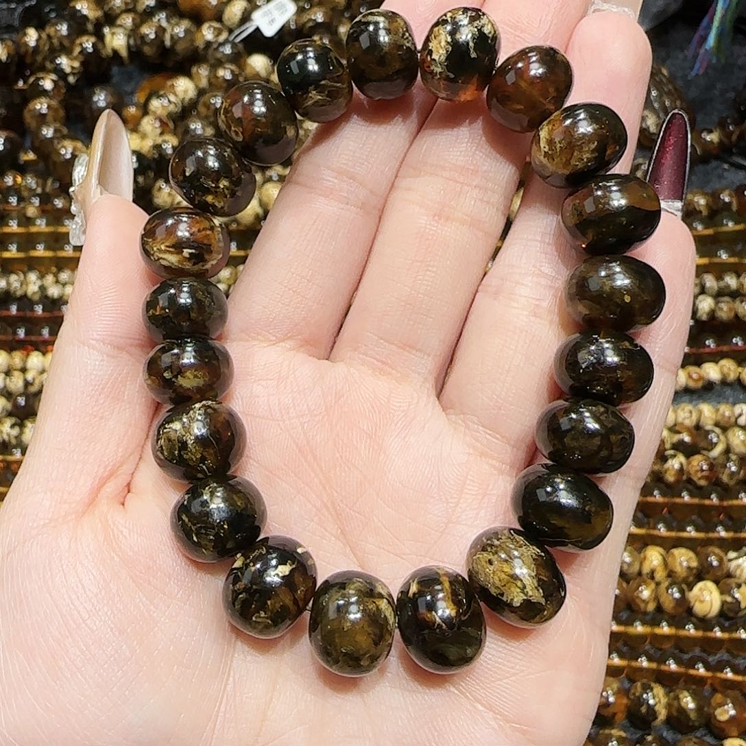 琥珀耳饰未镶嵌海****蚁抚顺琥珀