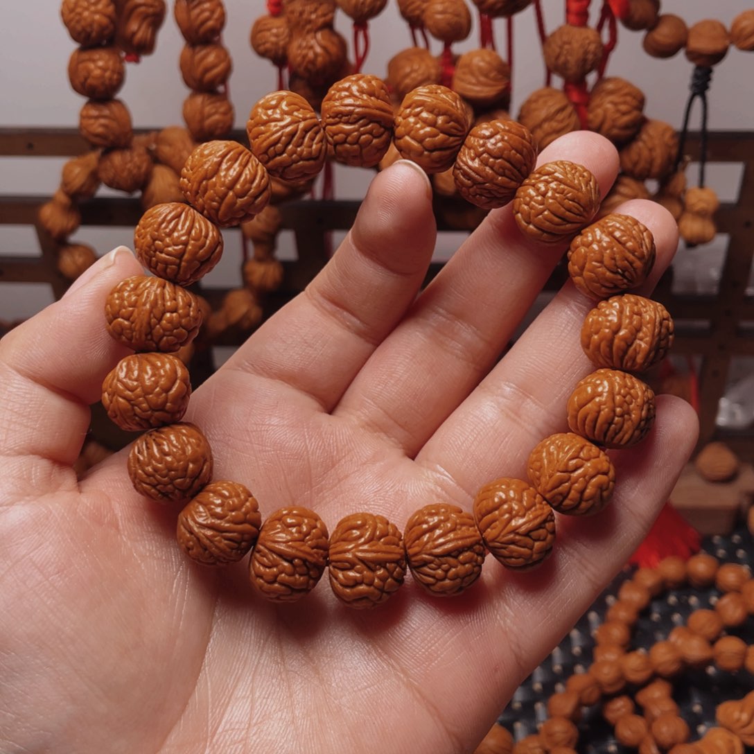 木质类龙纹桃枭手串