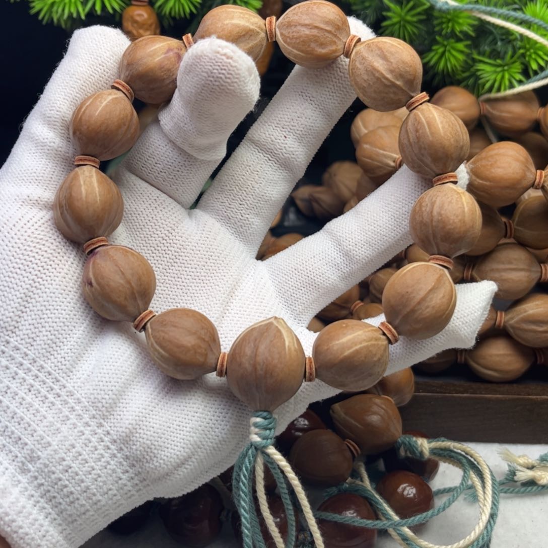 手串/手链橄榄核白*鸦1.7*2.0三花铁核