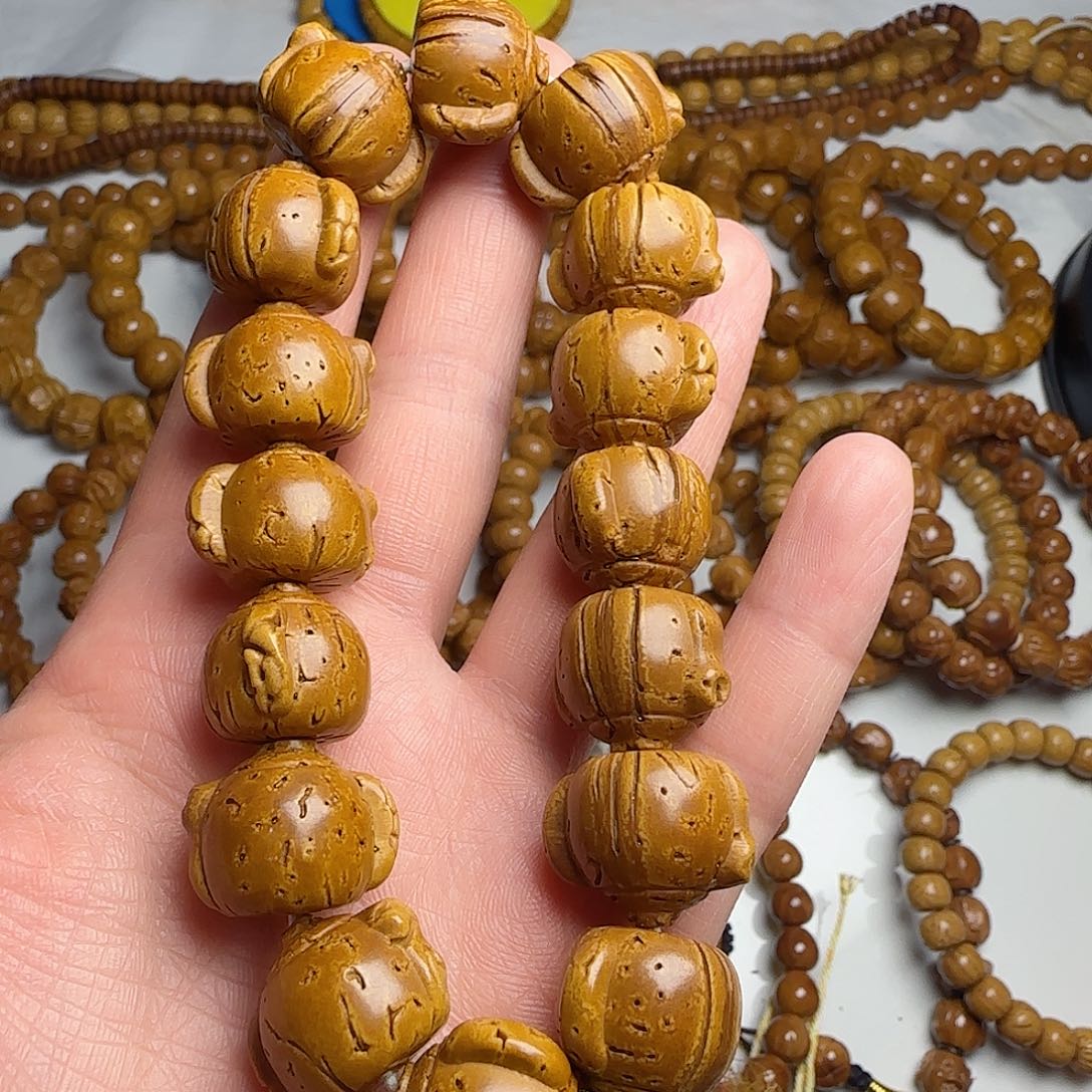 用***德非洲檀香无事牌精品桃核手串