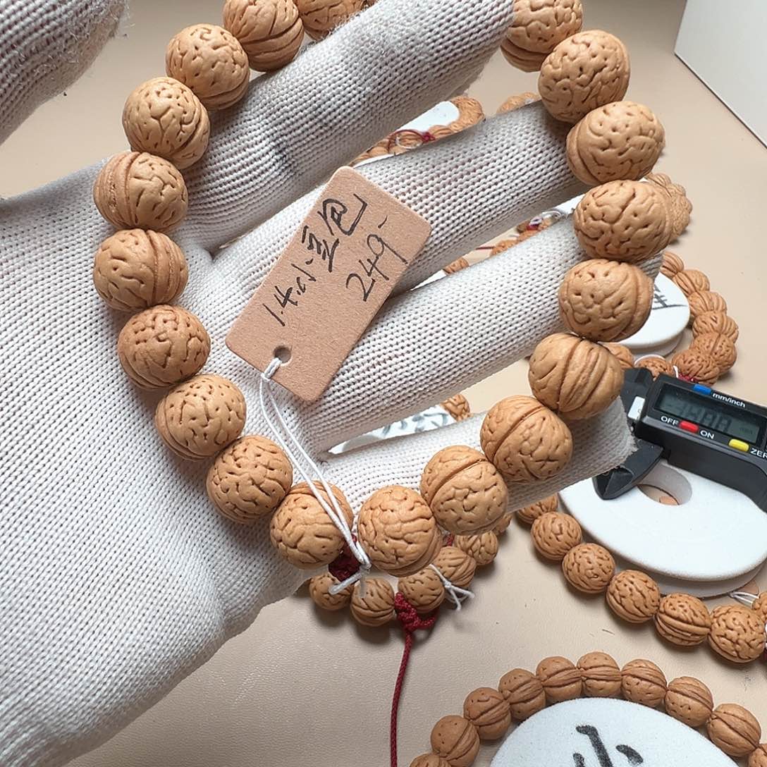 铁***憨桃核手串1.4小豆包