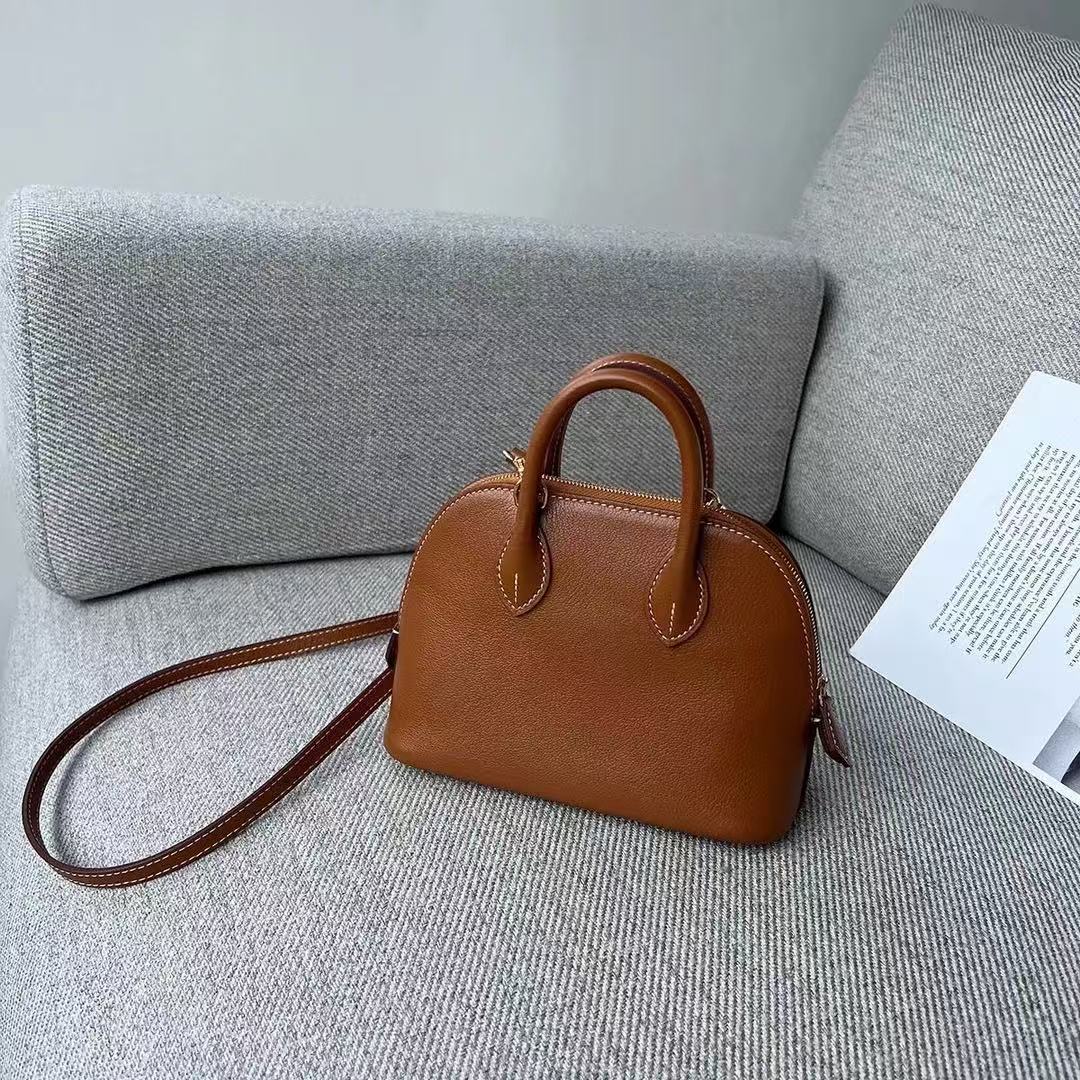 yuan单双十一预热礼遇白三彩贝壳单肩包