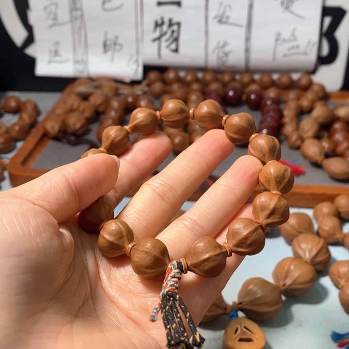 橄榄核手串4131精品蒜头小红核14+1颗