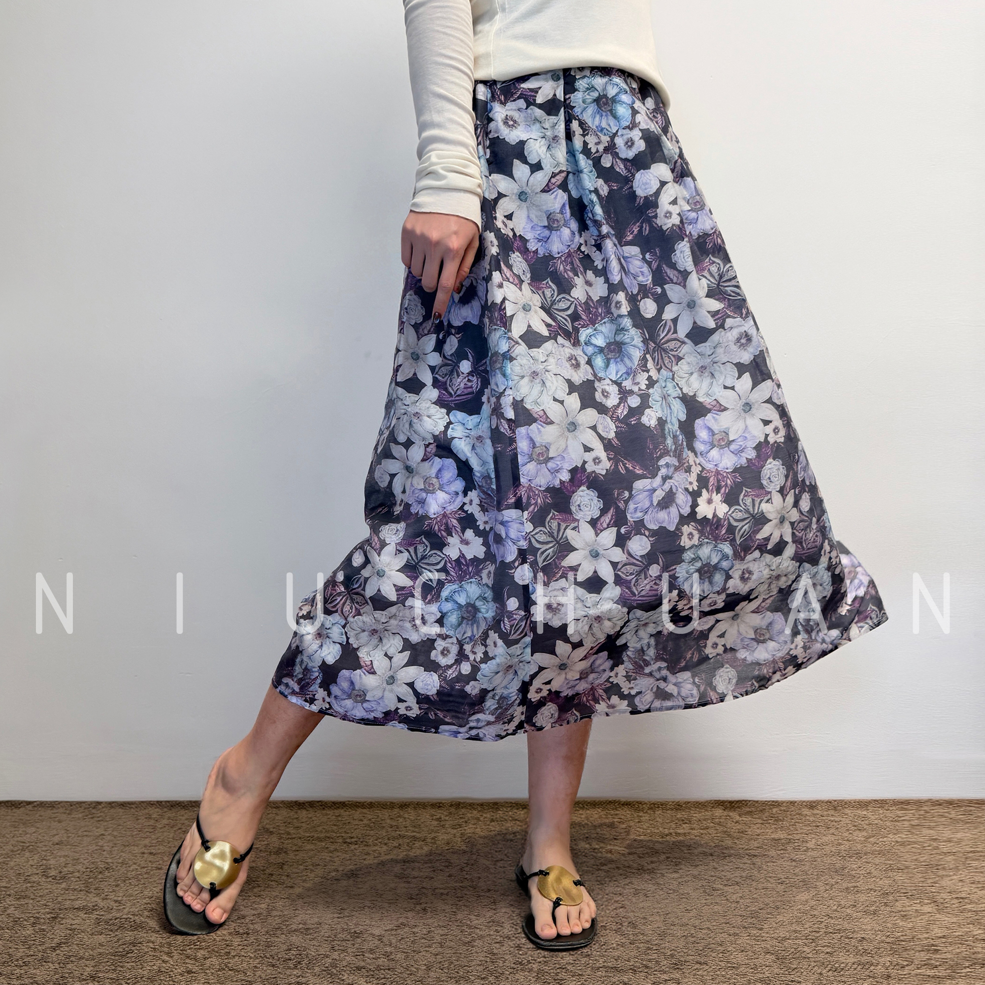 风语织」女士中长款大摆A字裙 它让你相信：浪漫，是一种清醒的选择