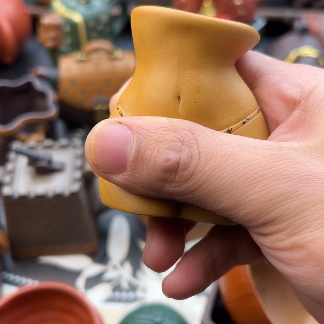 紫砂茶壶杯子的味道就好像