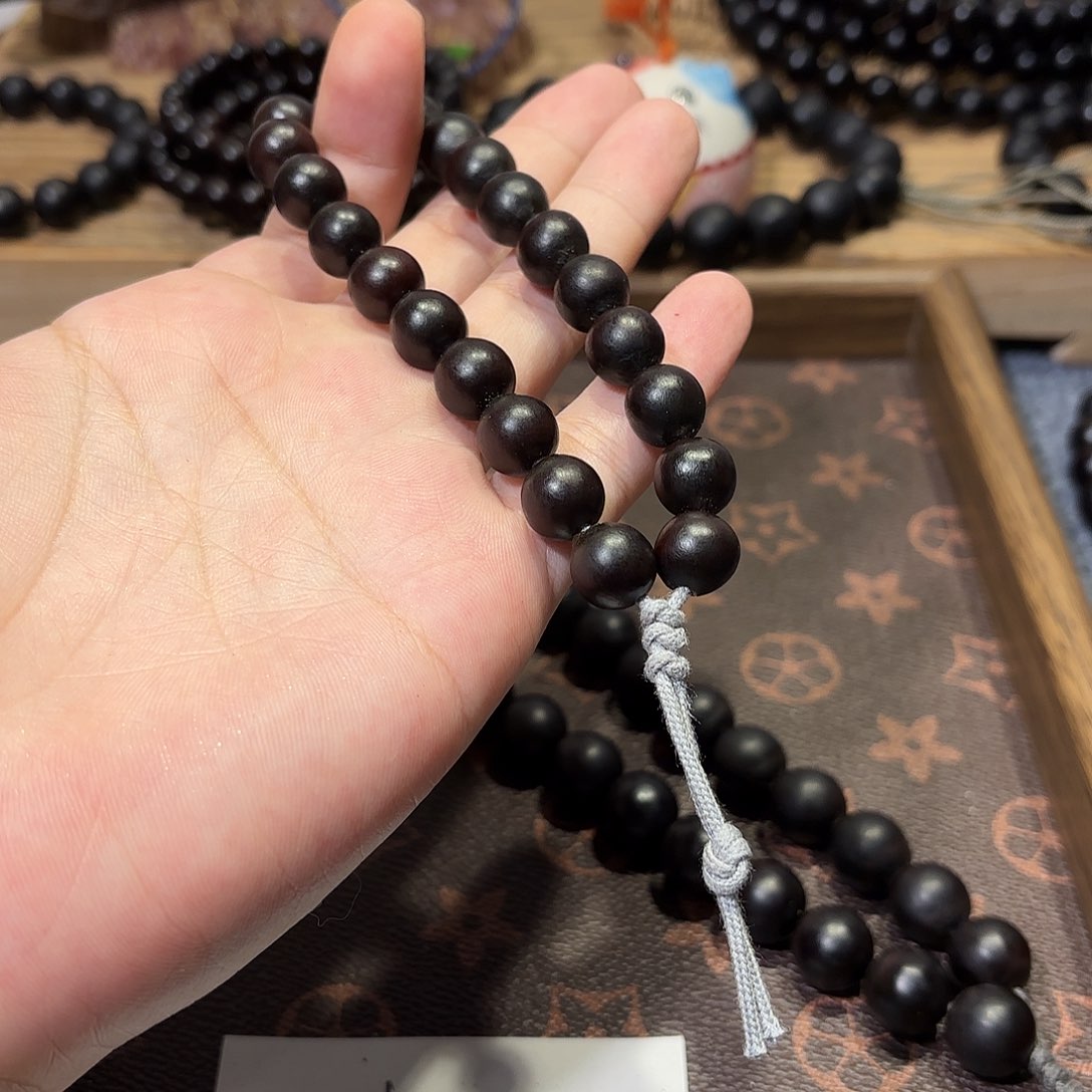 圊***囩草珠菩提手串手持