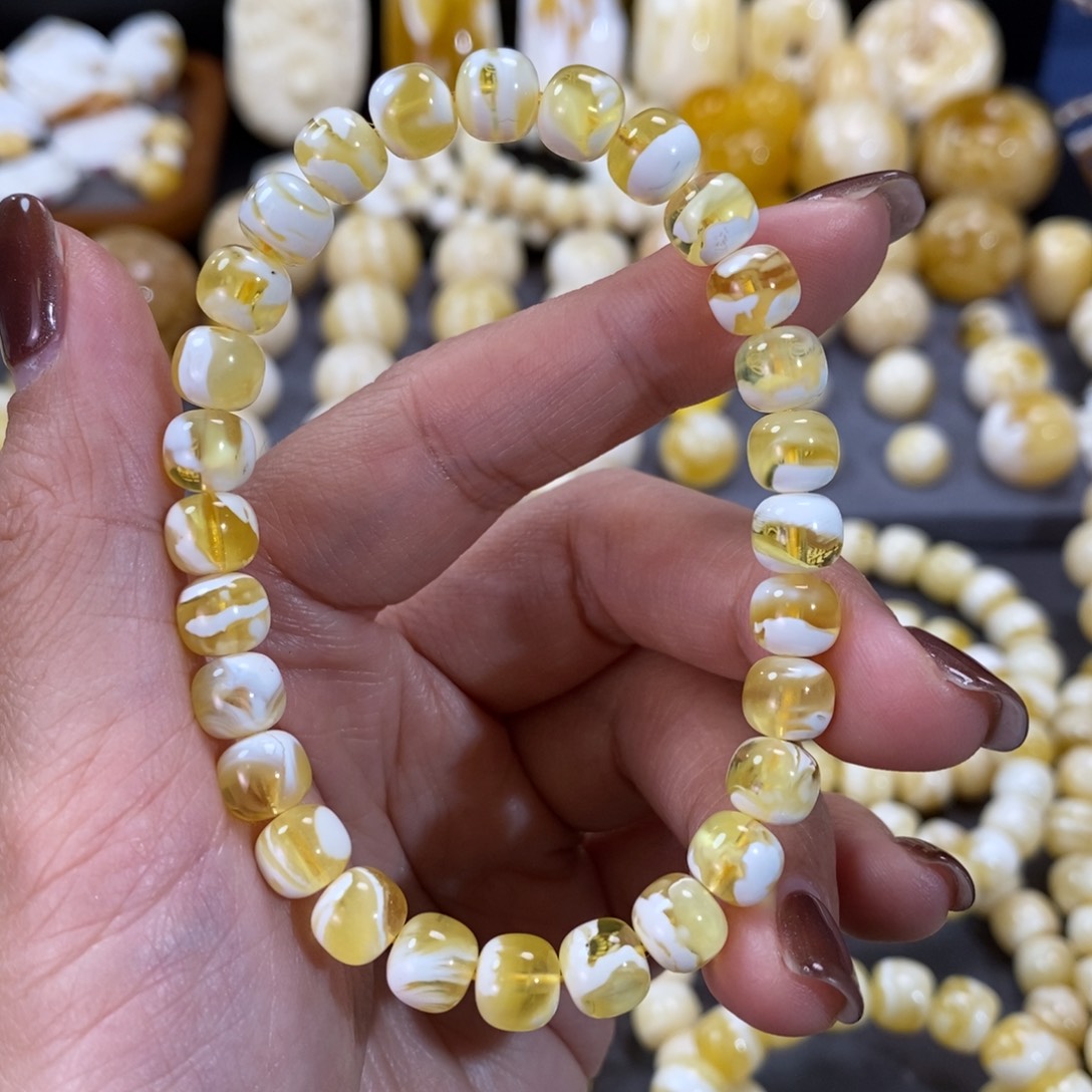 蜜蜡手串未镶嵌存*7x7.5mm金漆白溶洞手串