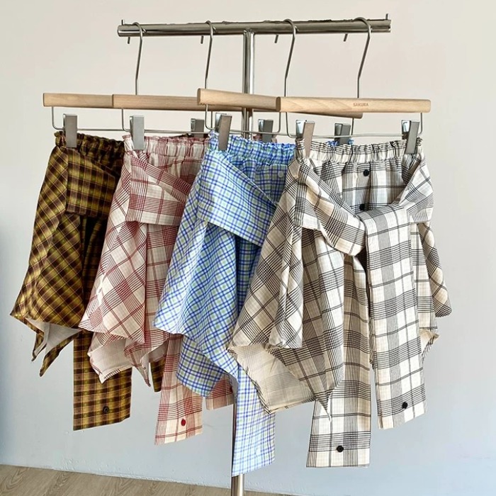 2025年夏季新款韩系设计感别致学院风撞色格子绑带假两件半身裙女