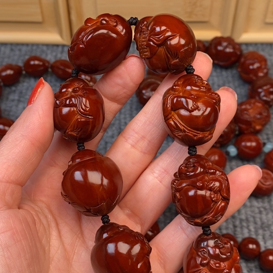 腾***司手串/手链橄榄核四花弥勒