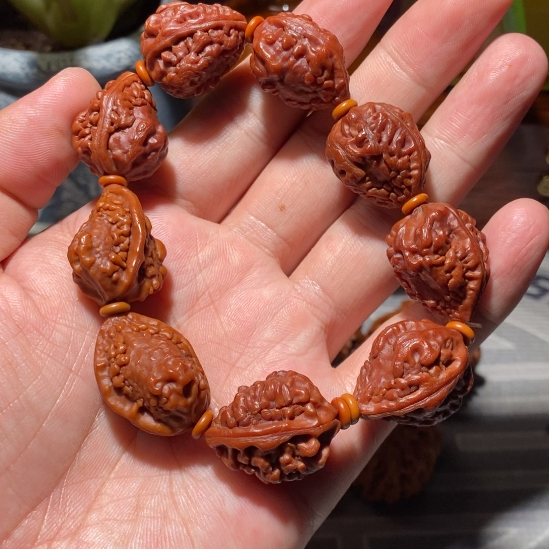 土***粉文玩核桃把件麒麟角串