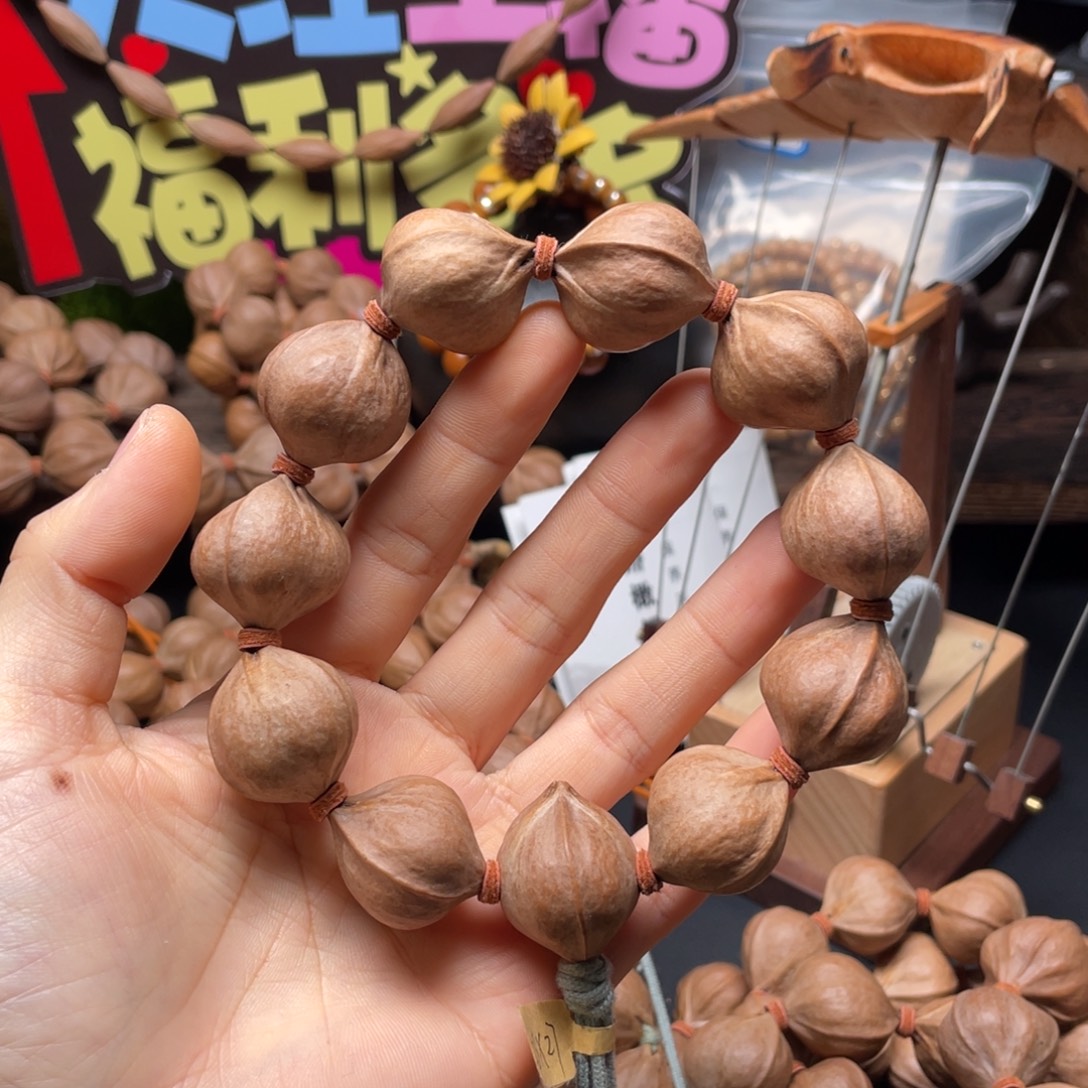 扬***航橄榄核吊坠2327铁