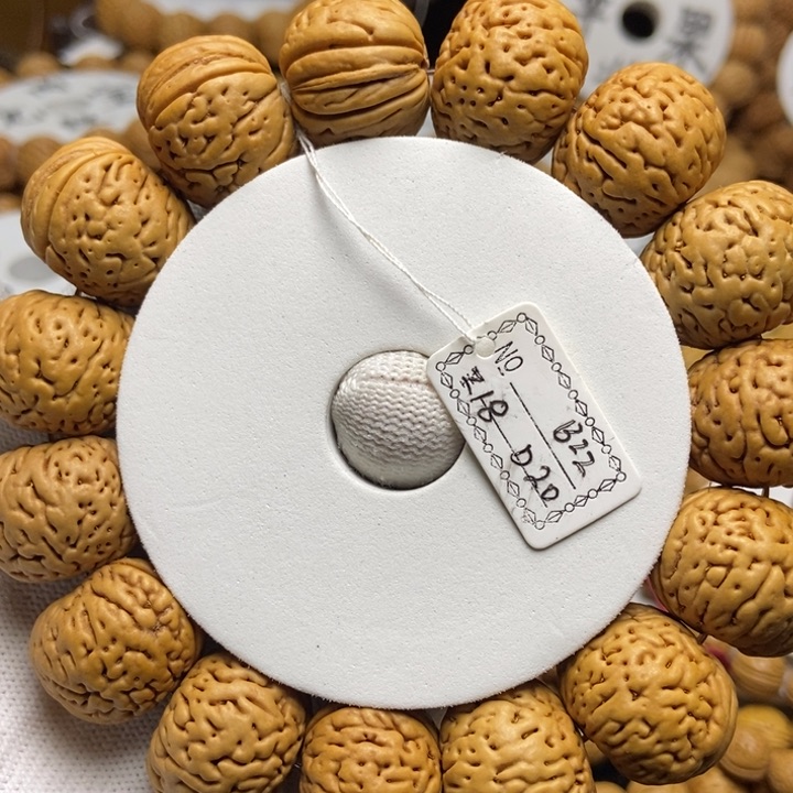 桃核手串大****?磨盘打手串