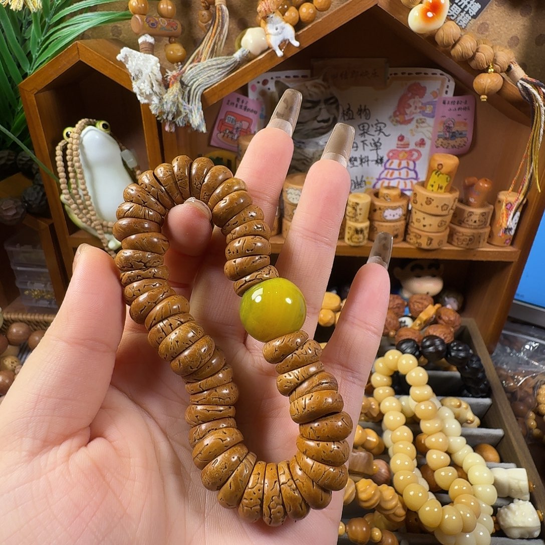 十***粑桃核吊坠缠丝墩墩