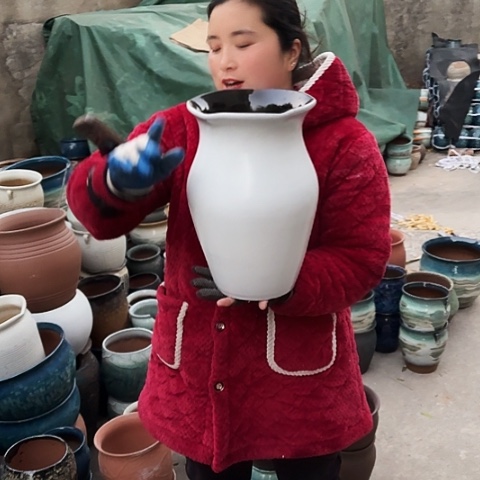 口20高32瑕疵盆子。  