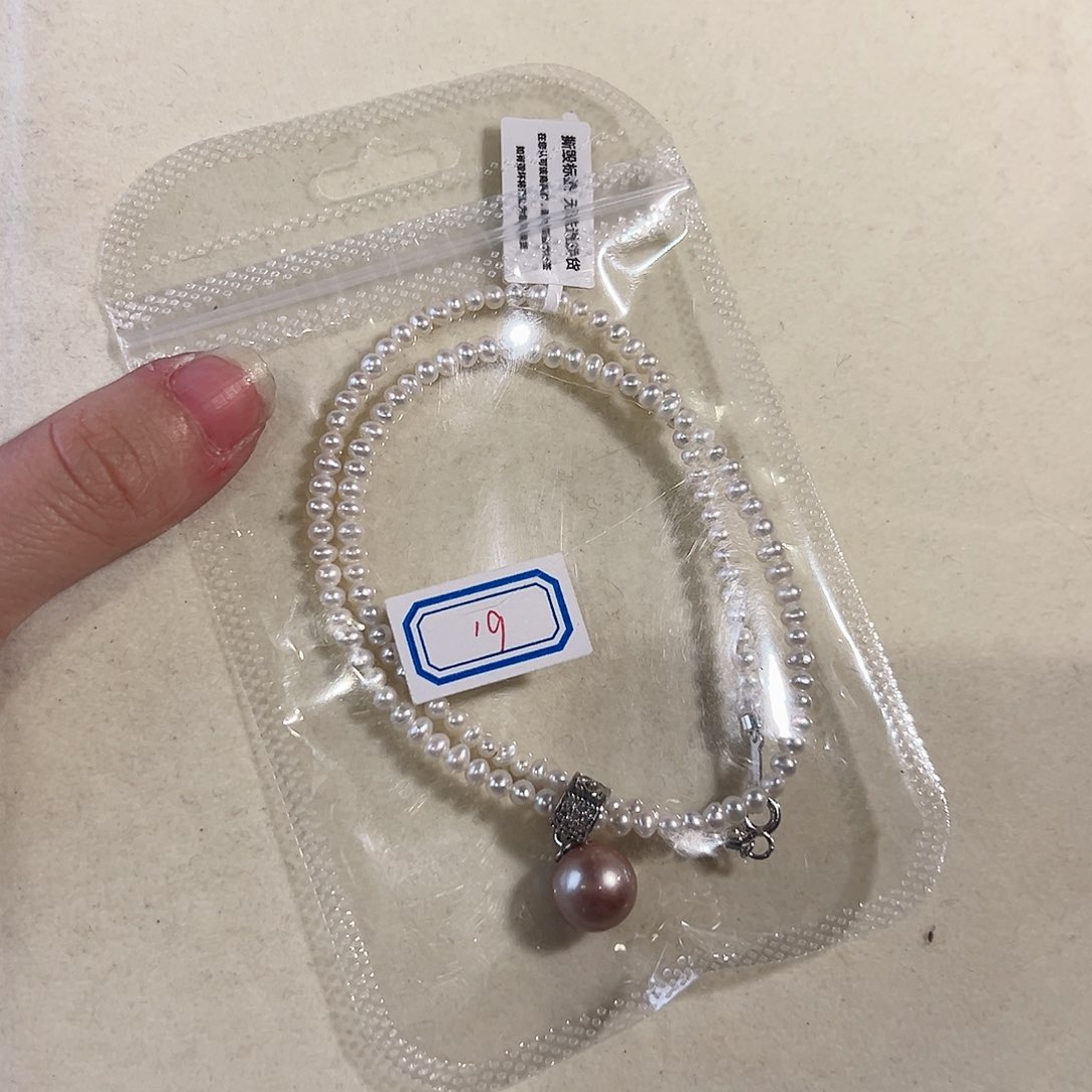 淡水珍珠耳饰未镶嵌骆***草