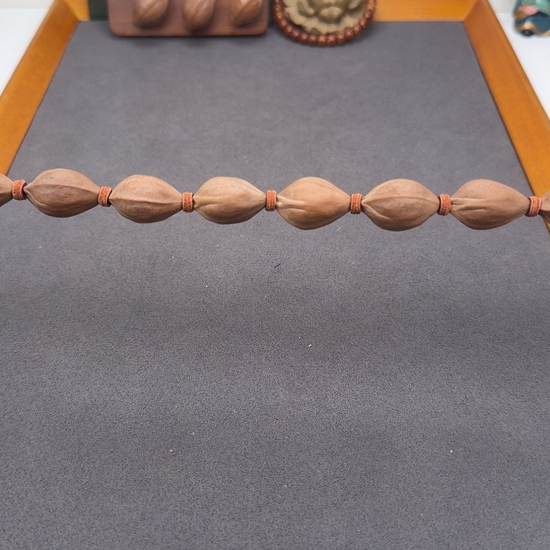 16*26三面佛梅林铁核手串