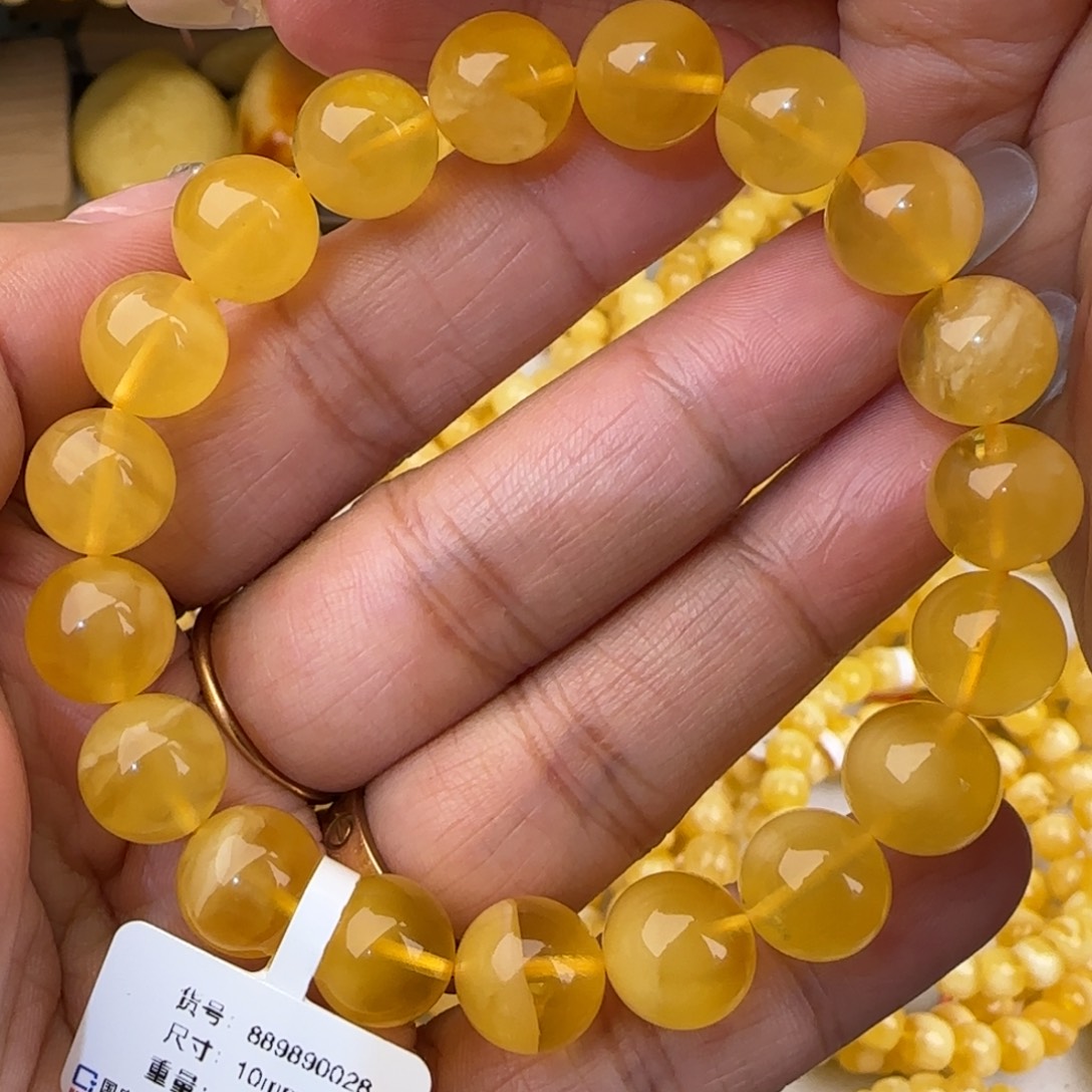 蜜蜡未镶嵌手串鸡油黄金绞蜜圆珠手串