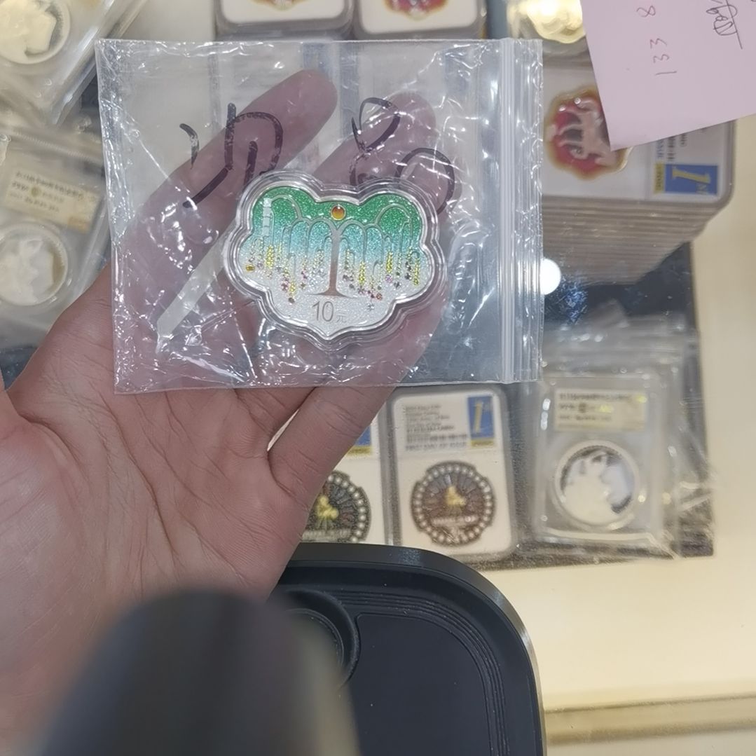 葫***向纯银漫漫日茂一枚