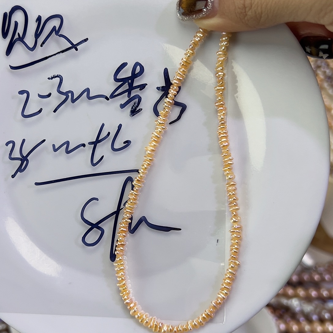 B***贝钛钢手绳淡水珍珠