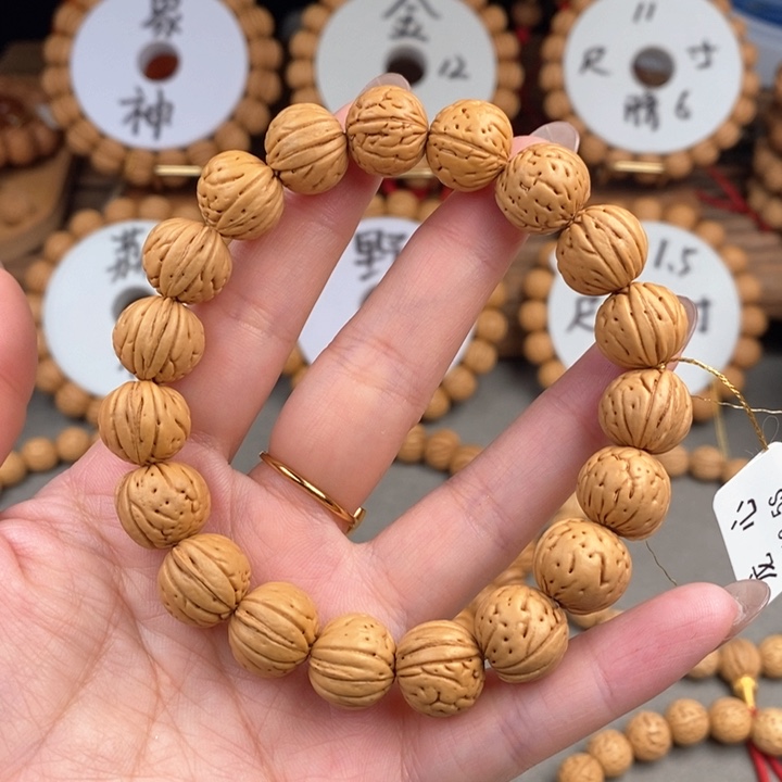 桃核手串龙心13.5s……