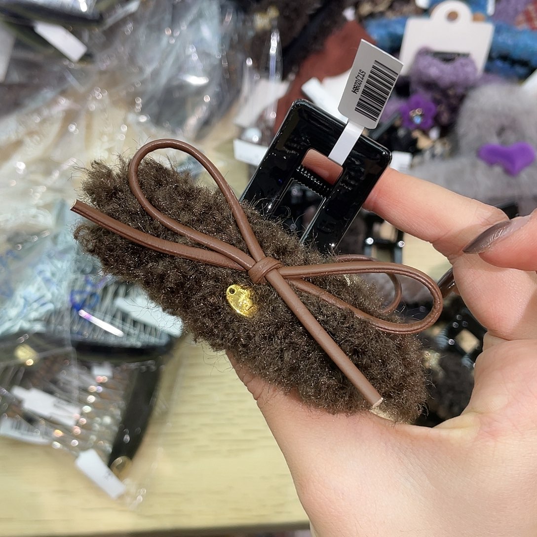 羽毛非金属咖色蝴蝶结9抓