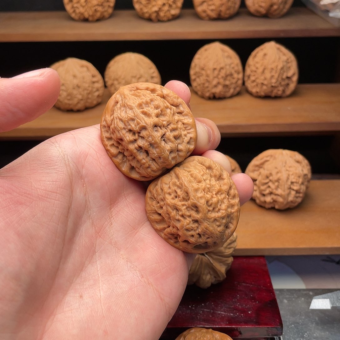 文玩核桃把件39红皮头货精配金公子