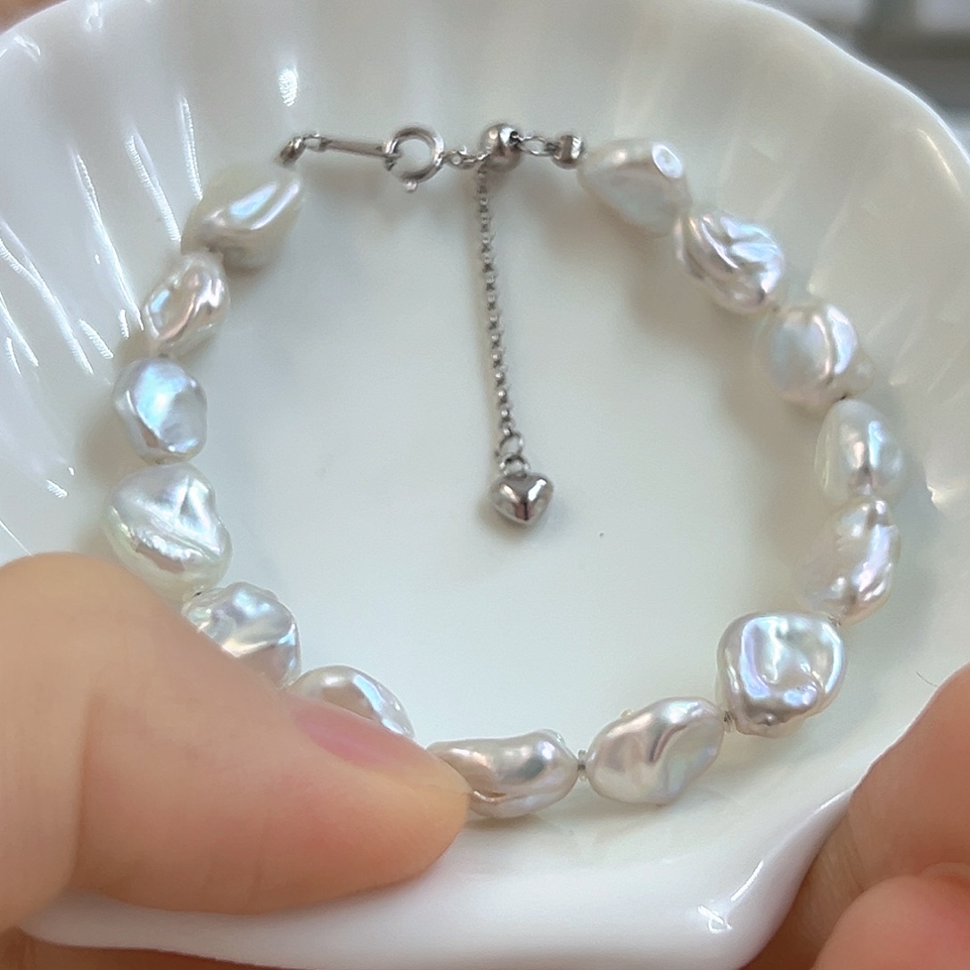 蜜***羽银S925镶嵌颈饰淡水珍珠