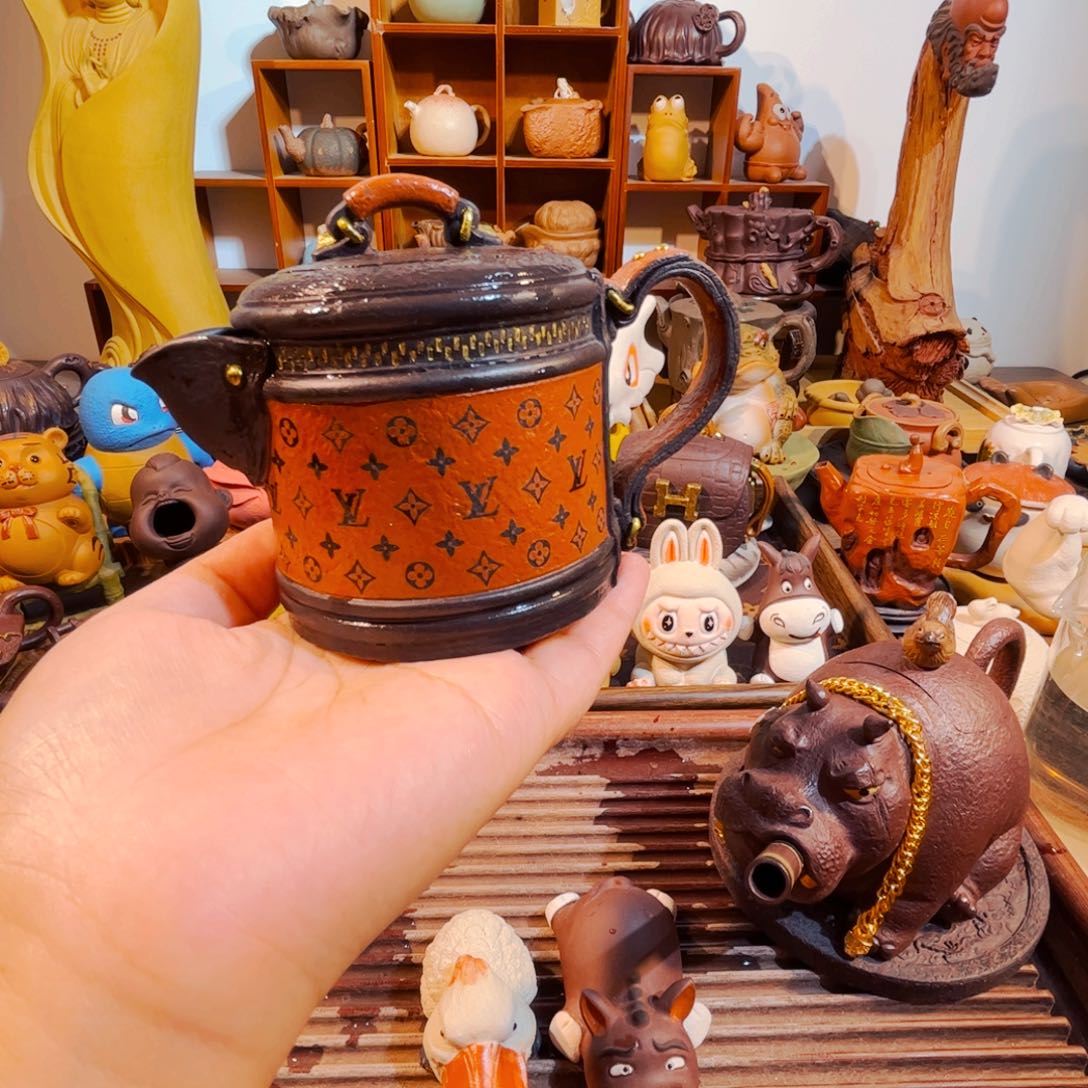 春***辉茶壶紫砂纯手工制作过程就是