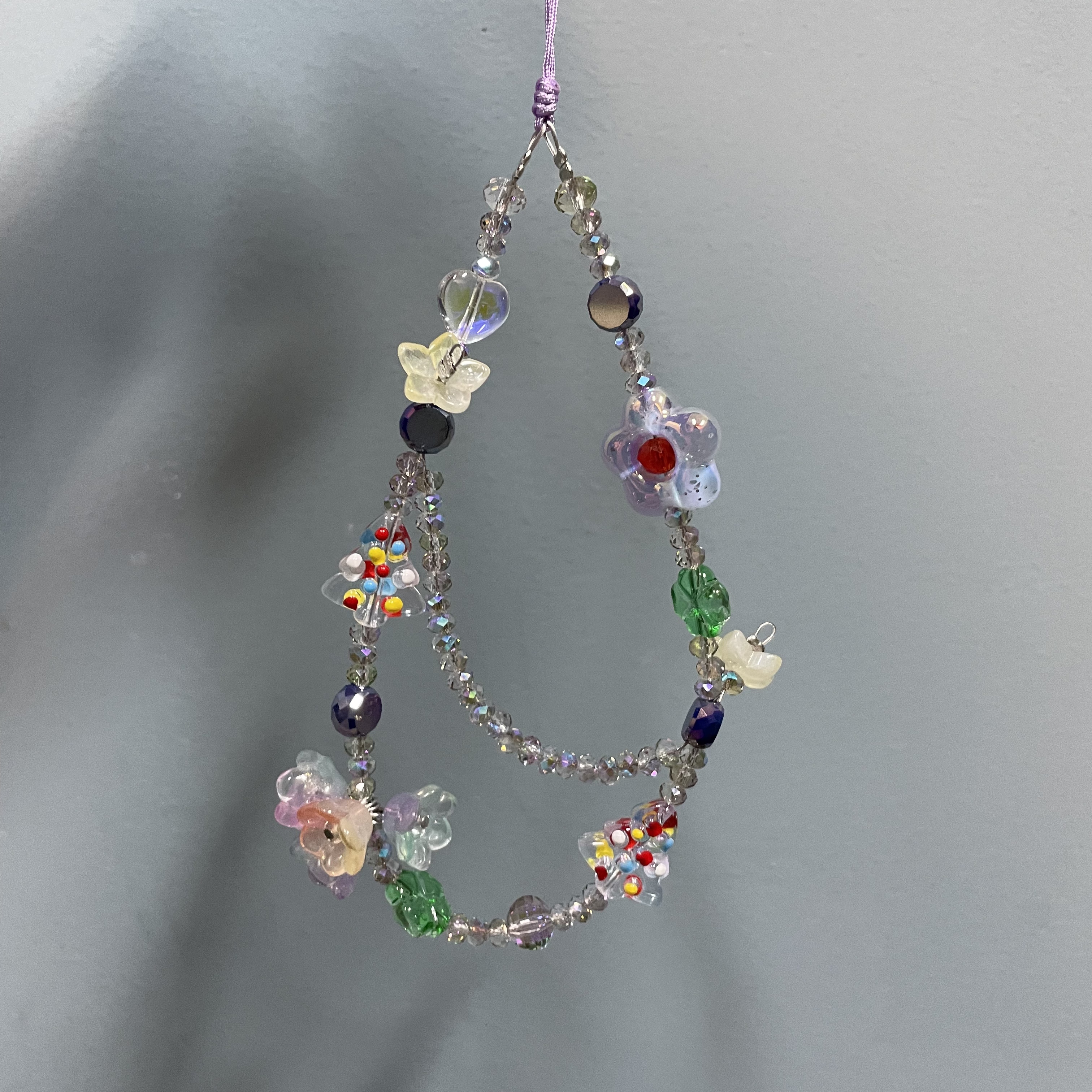 手腕绳款魅影紫色设计款手机链H297