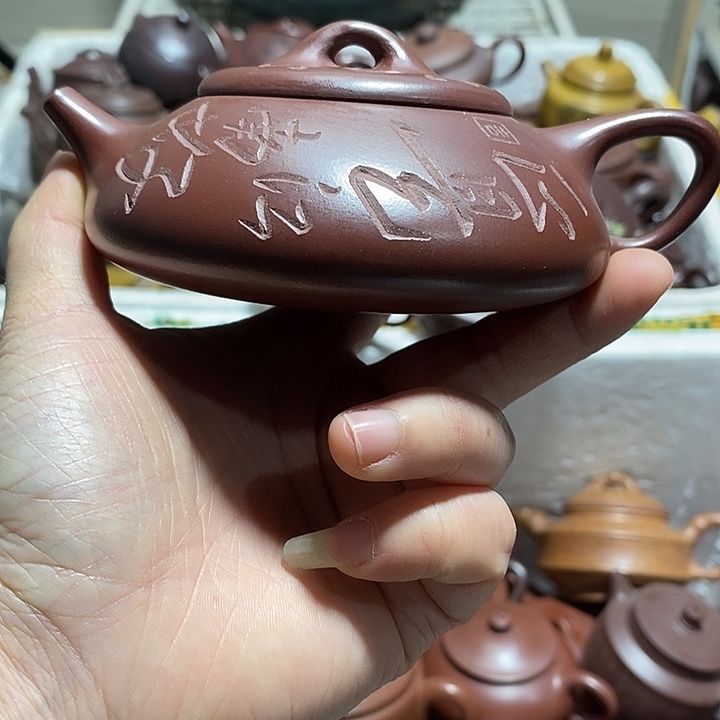 紫砂茶壶微瑕微笑