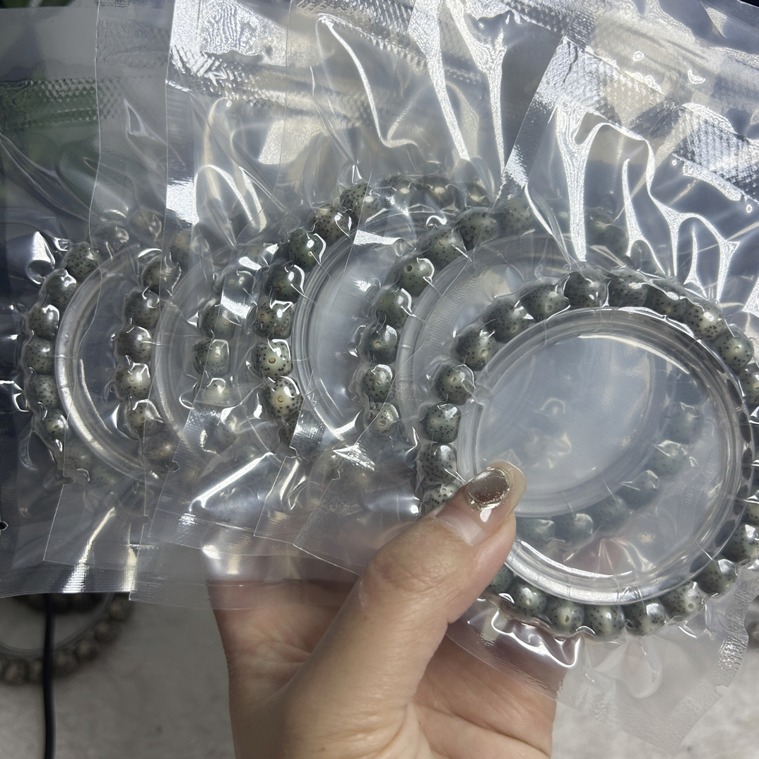 海南原生态星月菩提石玉料绿幽灵9文玩手串