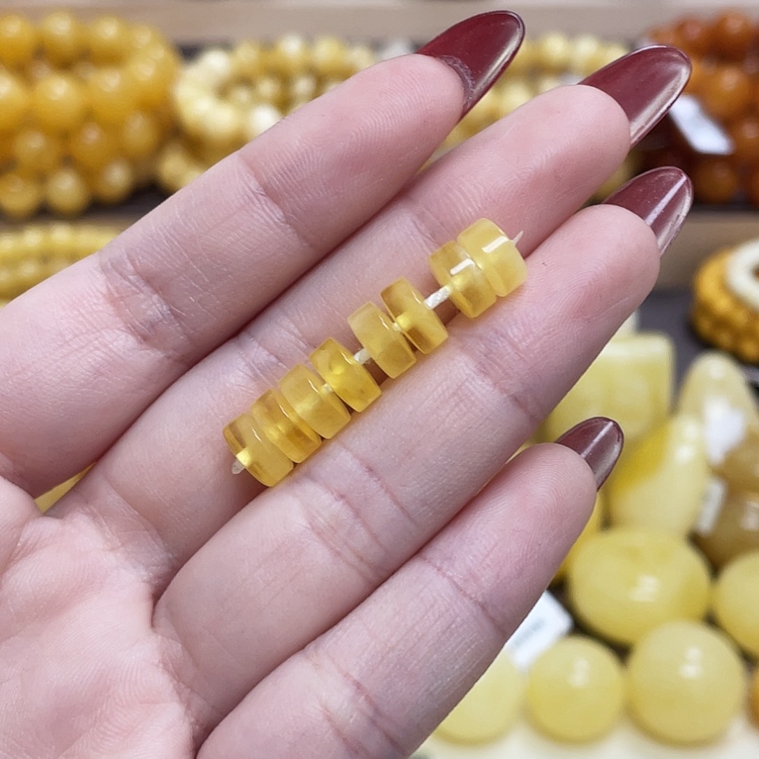 蜜蜡未镶嵌珠宝奇石2****l7.9*3.6mm蜜蜡隔片 瑕