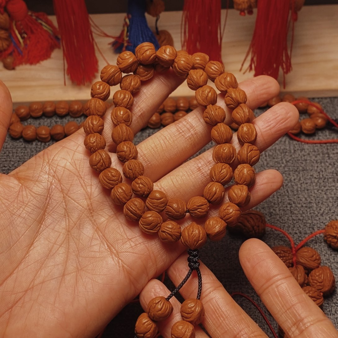 樂***居吊坠桃核桃枭手持1