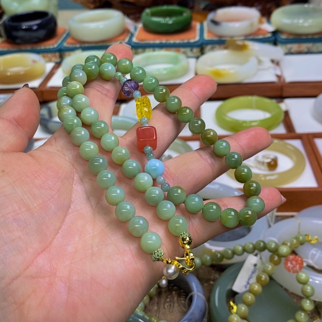 和田玉糖三彩8未镶嵌芋***紙