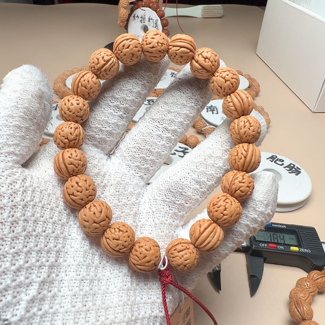 清***风手串桃核1.2肥脐肠纹