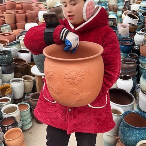 口29高27瑕疵口裂盆子。 