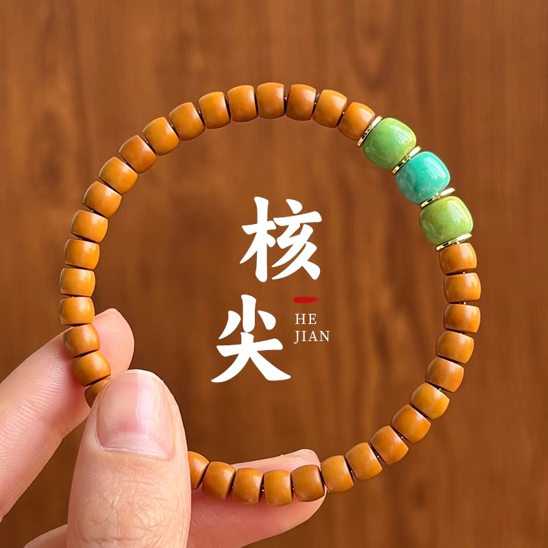 橄榄核核尖手串雕刻猴头直切桶珠核桃盘玩单圈手串男