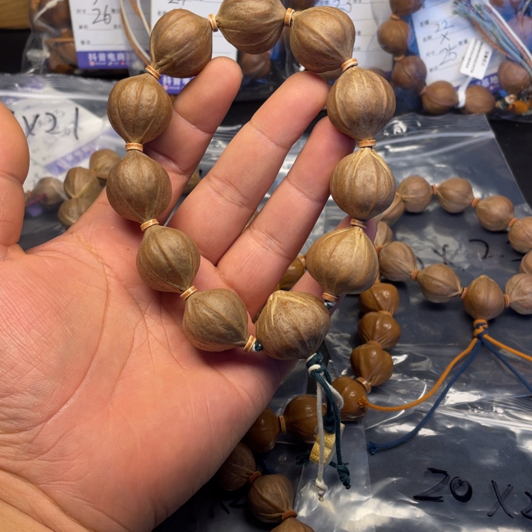 .***.橄榄核手串正四花25x25